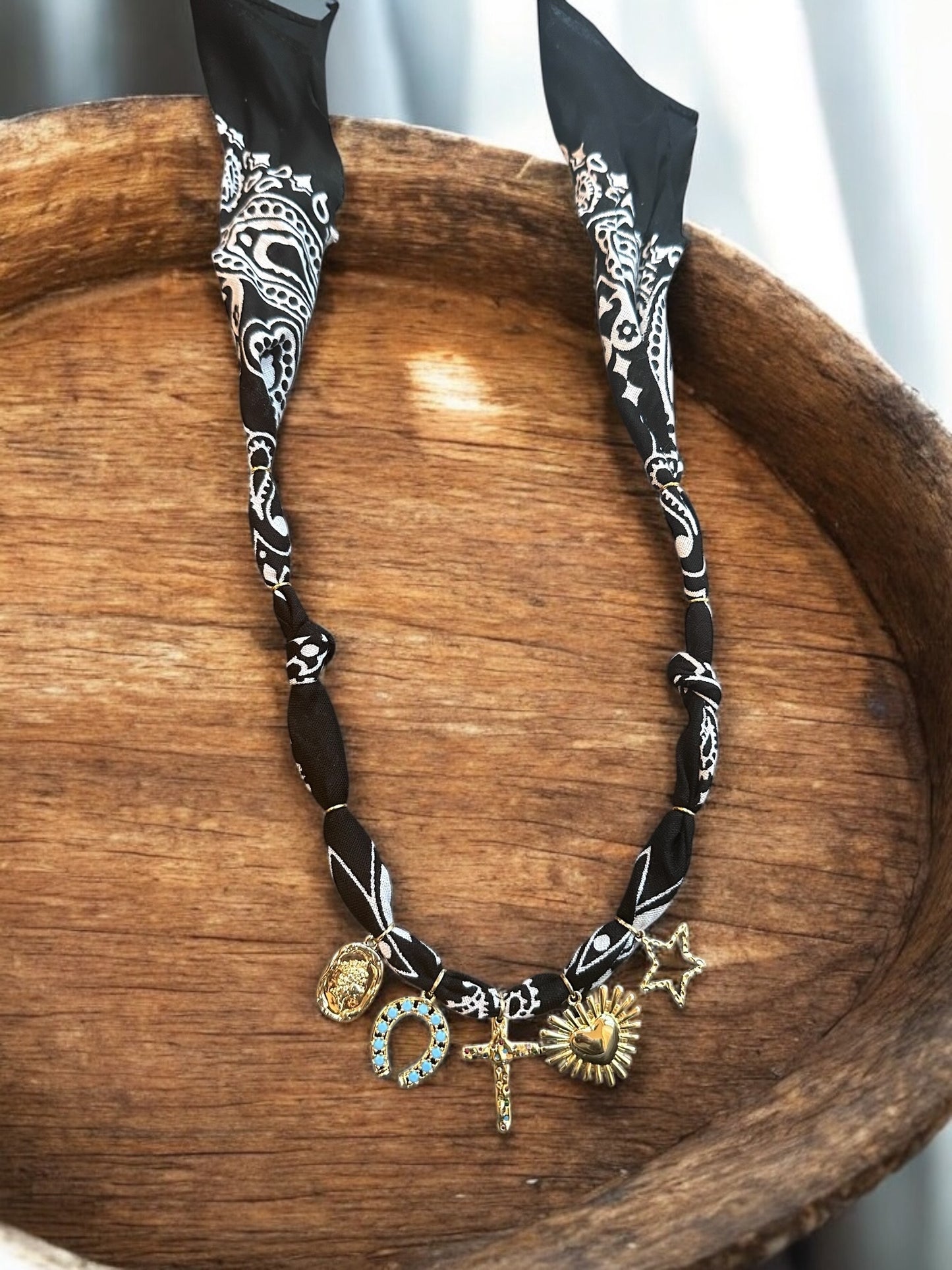 Black with Gold Colored Stone Cross